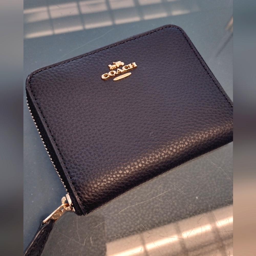 Black Leather Coach Wallet with Gold details. NWOT